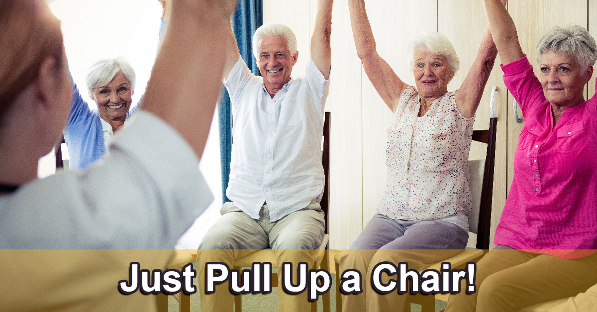 Seniors using a kitchen chair to do seated exercises