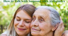 How to Talk with Someone with Alzheimers. Picture of a young caucasian woman hugging a caucasian elderly woman.