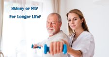 Skinny or Fit for Longer Life? Picture of an elderly caucasian male working out with light dumbbells under the supervision of a younger caucasian female physical therapist.